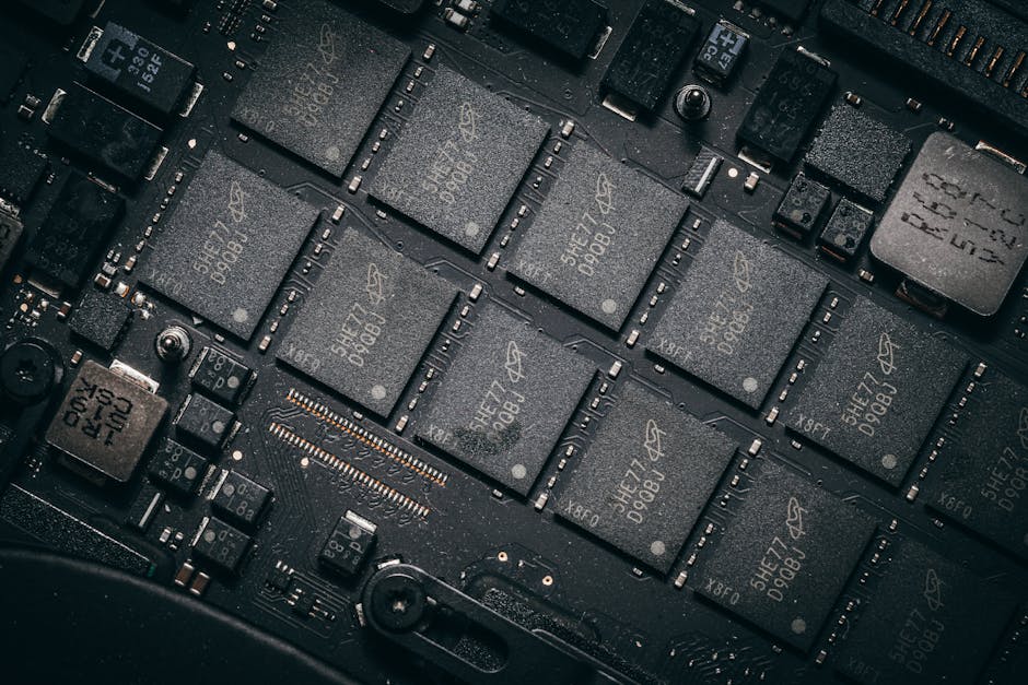 Detailed view of electronic circuit board components showcasing microchips and technology