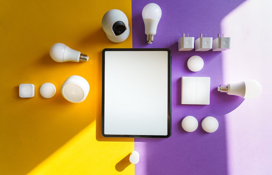 Top view of smart home devices and tablet on split yellow and purple background
